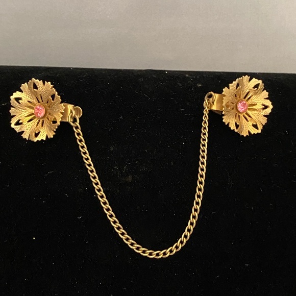 Accessories - Vintage gold tone sweater guard with pink rhinestones in the flower ends